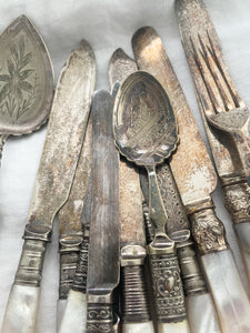 Lot of silver and mother of pearl petite antique silverware
