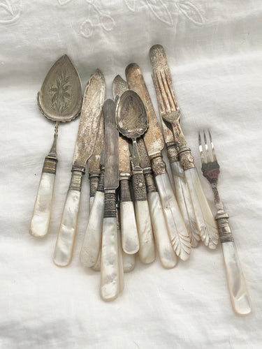 Lot of silver and mother of pearl petite antique silverware