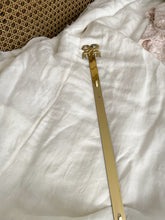 Load image into Gallery viewer, Brass bow painting or plate hanger