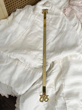 Load image into Gallery viewer, Brass bow painting or plate hanger