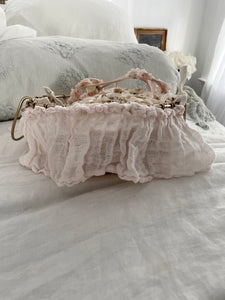 Palest pink ruffle wire basket